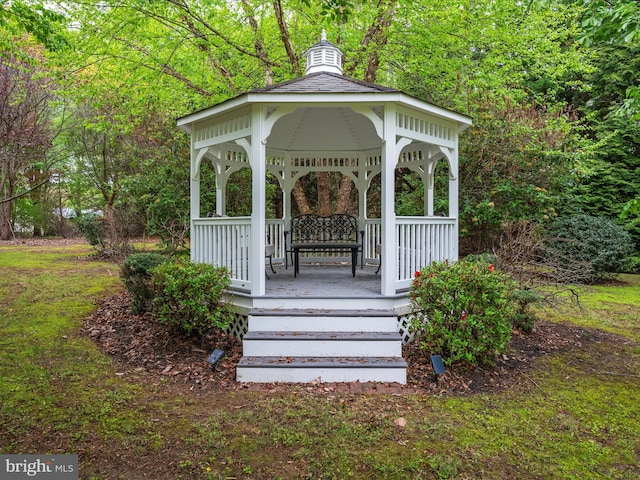 wooden terrace with a gazebo