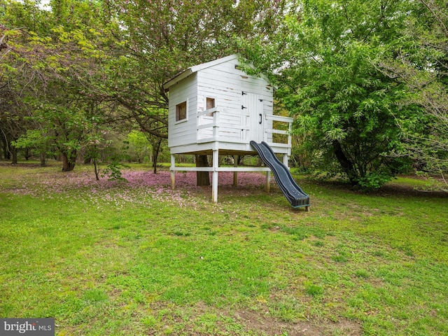 view of playground featuring a yard