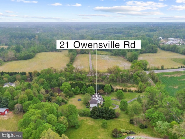 aerial view with a wooded view