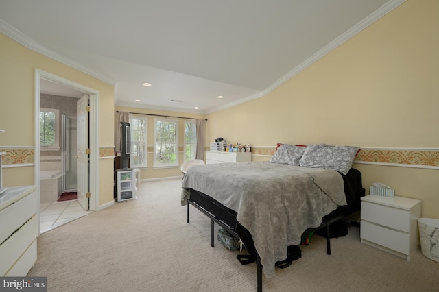 bedroom with light carpet, ensuite bath, recessed lighting, and ornamental molding