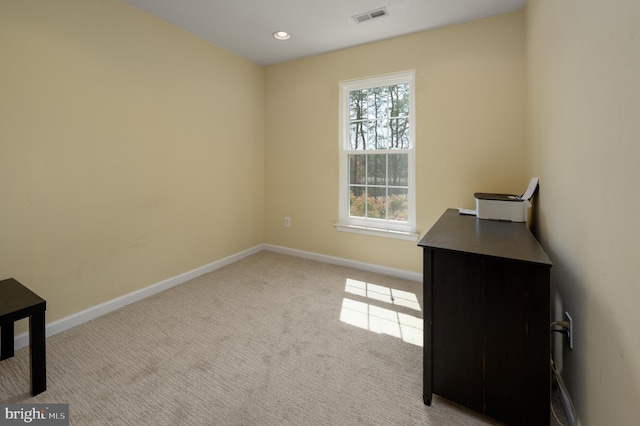interior space featuring recessed lighting, carpet floors, visible vents, and baseboards