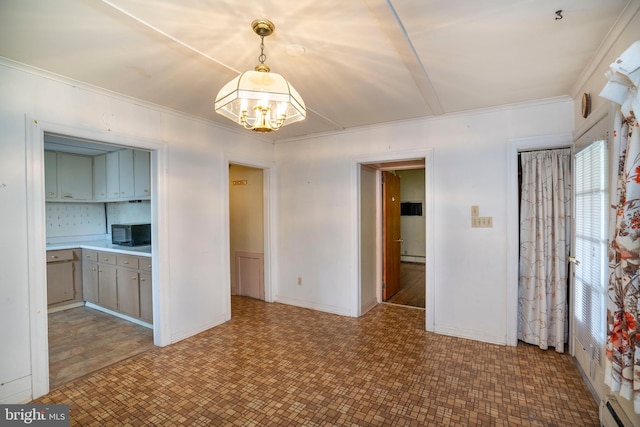 139 Kimport Ave, Boalsburg, PA 16827 - unfurnished dining area featuring tile patterned floors, a chandelier, a baseboard radiator, and crown molding