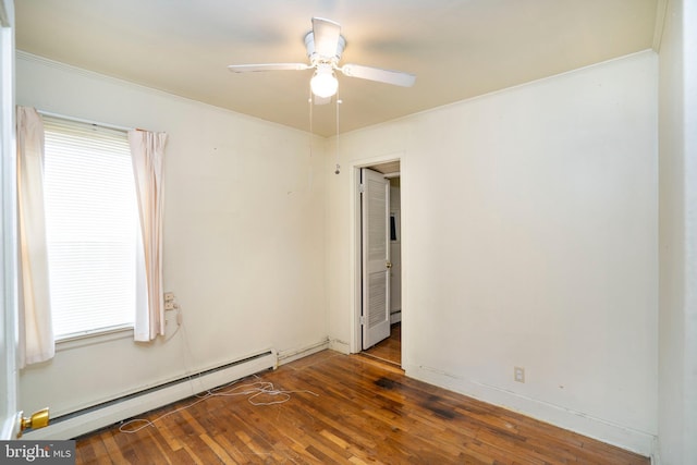 139 Kimport Ave, Boalsburg, PA 16827 - empty room with a baseboard radiator, hardwood / wood-style flooring, ornamental molding, plenty of natural light, and a ceiling fan