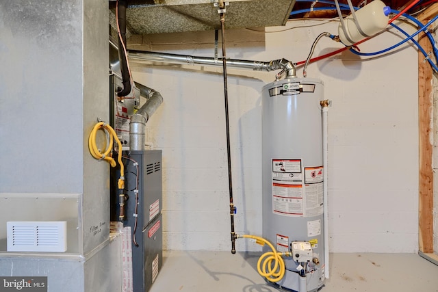 utility room with water heater