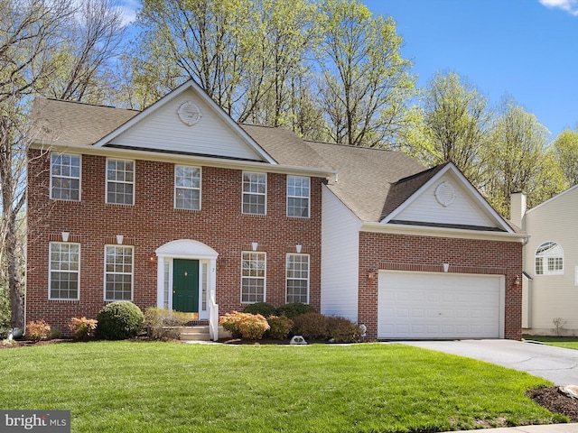 view of front of home with brick siding, a front lawn, a garage, and concrete driveway