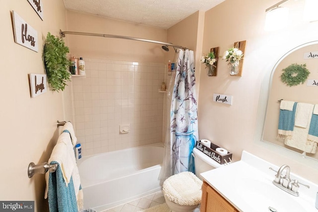 bathroom with a textured ceiling, vanity, tile patterned flooring, toilet, and shower / tub combo with curtain