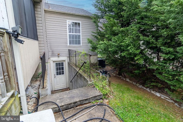 entrance to property with central AC unit