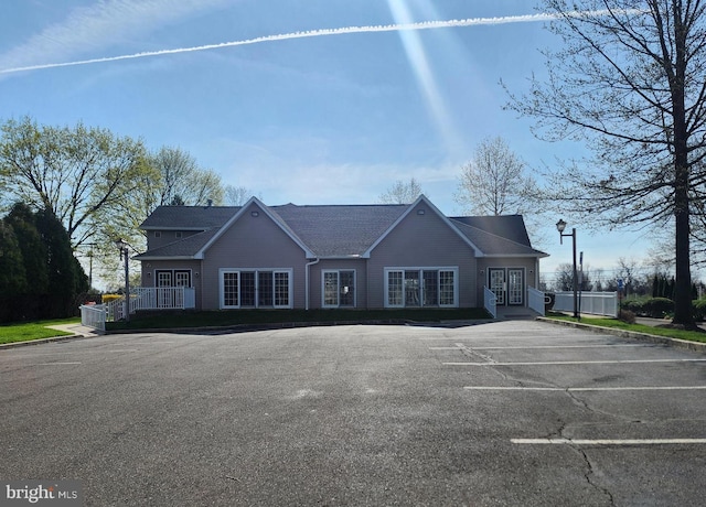 view of front of home with uncovered parking