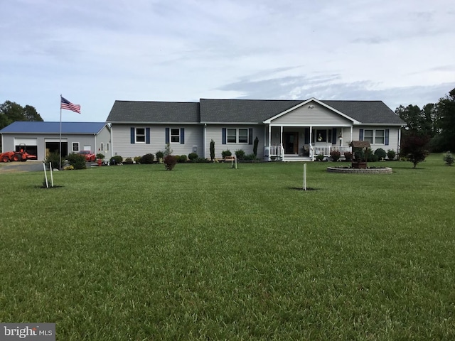 ranch-style house with an attached garage and a front lawn