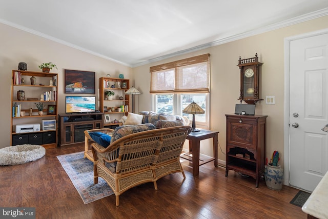living room with vaulted ceiling, ornamental molding, and wood finished floors