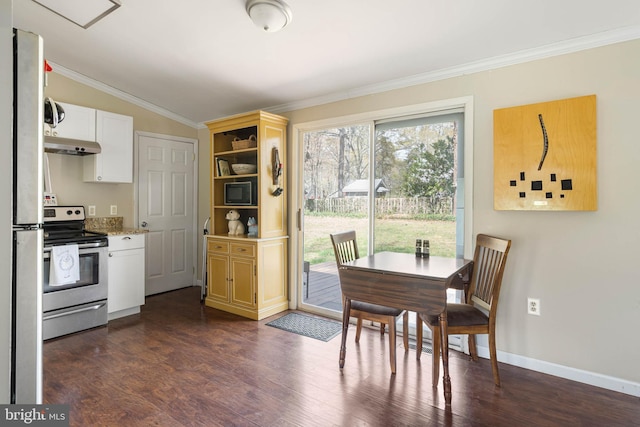 dining area with crown molding, dark wood finished floors, baseboards, and lofted ceiling