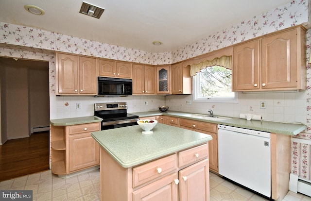 745 Champlain Dr, King Of Prussia, PA 19406 - kitchen with white dishwasher, stainless steel range with electric stovetop, a sink, black microwave, and light floors