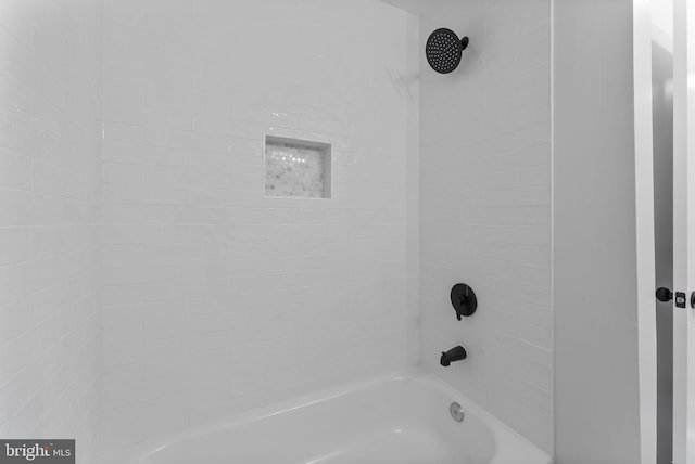 bathroom with shower / bath combination