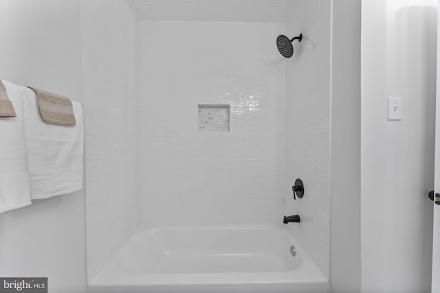bathroom featuring shower / tub combination
