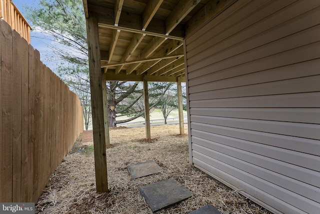 view of property exterior with fence