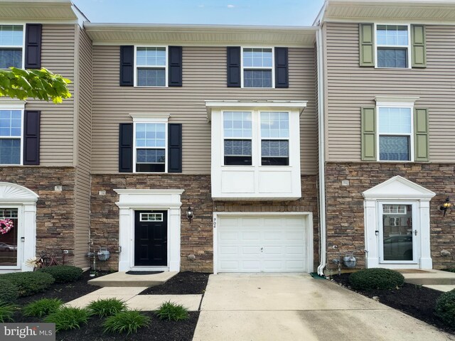 904 Emerson Ct, Clementon, NJ 08021 - multi unit property featuring stone siding, driveway, and a garage