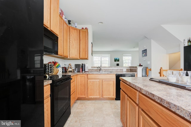904 Emerson Ct, Clementon, NJ 08021 - kitchen featuring black appliances, light countertops, a peninsula, and a sink