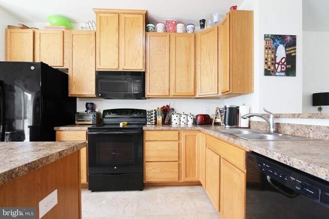 904 Emerson Ct, Clementon, NJ 08021 - kitchen with light countertops, a sink, black appliances, and light brown cabinetry