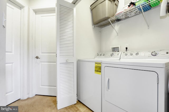 904 Emerson Ct, Clementon, NJ 08021 - laundry room featuring washing machine and dryer, light colored carpet, and laundry area