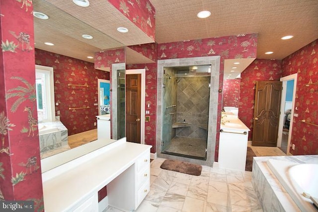 712 Riverside Pines Ct, Salisbury, MD 21801 - full bathroom with wallpapered walls, a garden tub, vanity, recessed lighting, and a stall shower