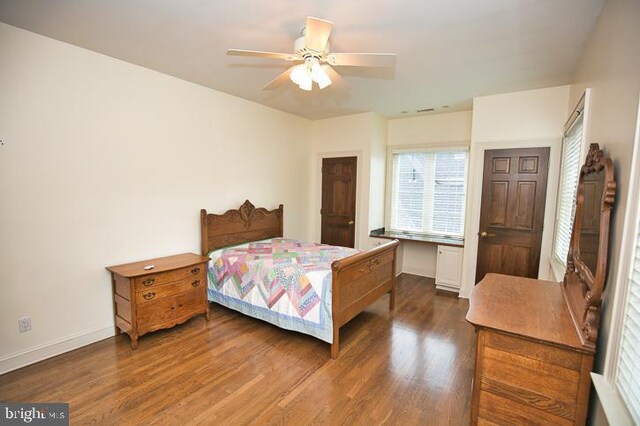 712 Riverside Pines Ct, Salisbury, MD 21801 - bedroom featuring wood finished floors, baseboards, and ceiling fan