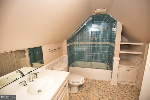 712 Riverside Pines Ct, Salisbury, MD 21801 - full bath featuring toilet, vanity, lofted ceiling, and shower / bath combination with glass door