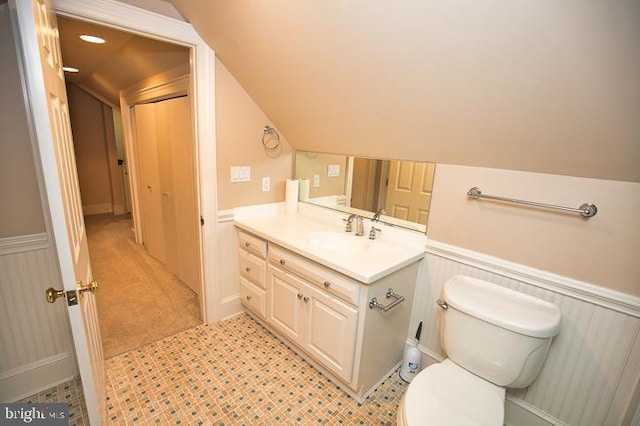 712 Riverside Pines Ct, Salisbury, MD 21801 - bathroom with a wainscoted wall, vanity, toilet, and a decorative wall