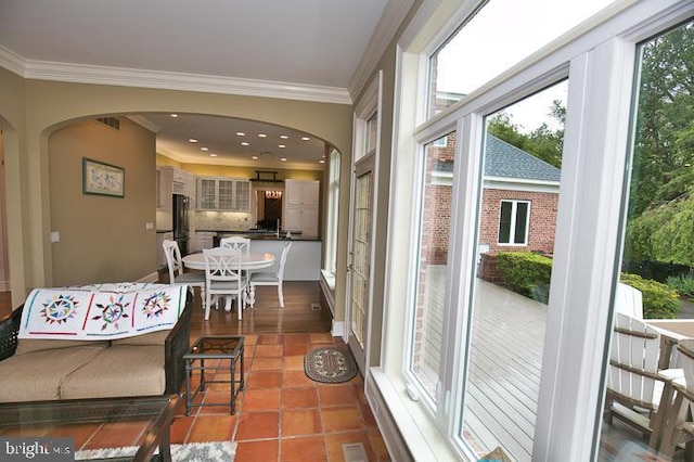 712 Riverside Pines Ct, Salisbury, MD 21801 - sunroom / solarium featuring arched walkways and healthy amount of natural light
