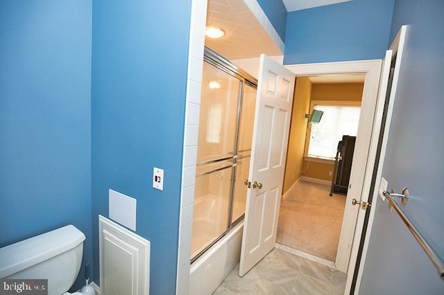 712 Riverside Pines Ct, Salisbury, MD 21801 - full bath featuring toilet, enclosed tub / shower combo, and baseboards