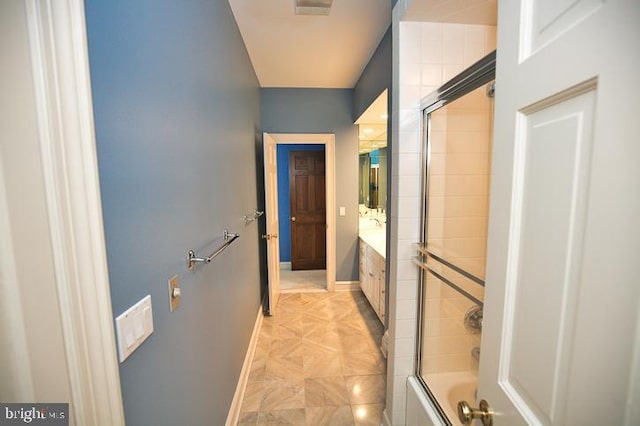 712 Riverside Pines Ct, Salisbury, MD 21801 - full bath with baseboards, vanity, and combined bath / shower with glass door