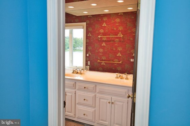 712 Riverside Pines Ct, Salisbury, MD 21801 - bathroom featuring recessed lighting, vanity, and wallpapered walls
