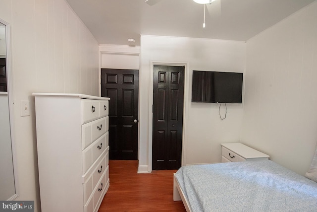 bedroom featuring wood finished floors