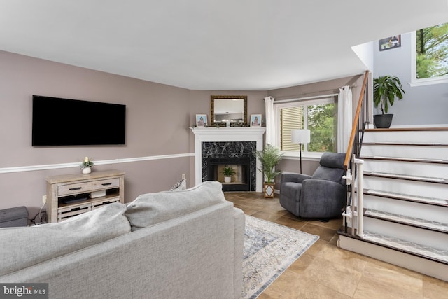 14 Cedar Ct, Flemington, NJ 08822 - tiled living room featuring stairs and a fireplace