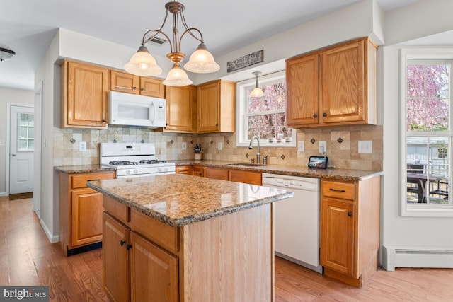 132 Heatherington Ct, Lanoka Harbor, NJ 08734 - kitchen featuring a sink, light wood finished floors, white appliances, and baseboard heating