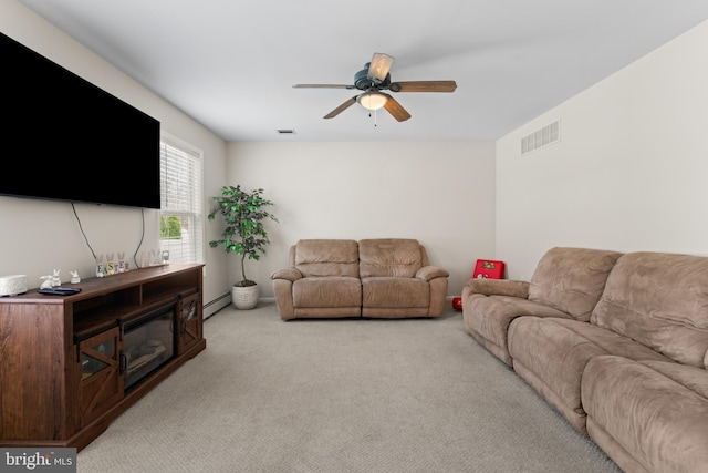 132 Heatherington Ct, Lanoka Harbor, NJ 08734 - carpeted living area with a baseboard radiator, ceiling fan, and visible vents