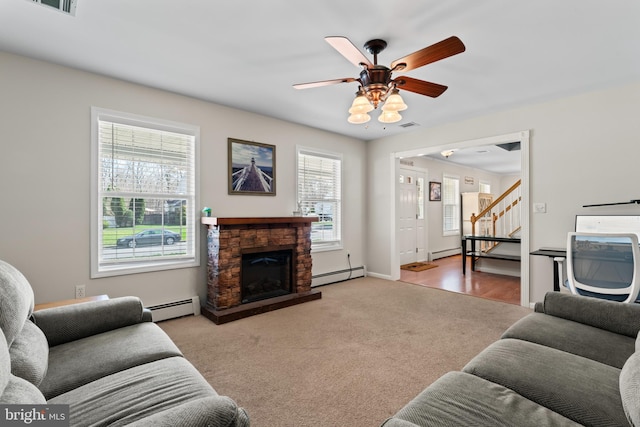 132 Heatherington Ct, Lanoka Harbor, NJ 08734 - living room featuring stairway, baseboard heating, and carpet floors