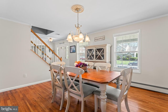 132 Heatherington Ct, Lanoka Harbor, NJ 08734 - dining room featuring stairs, crown molding, and wood finished floors