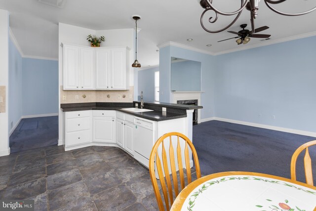 kitchen featuring ceiling fan, a sink, dark countertops, white dishwasher, and open floor plan