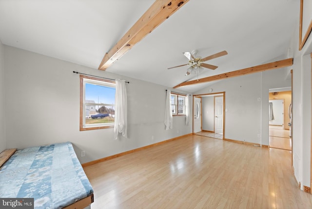 bedroom with light wood finished floors, baseboards, vaulted ceiling with beams, and a ceiling fan