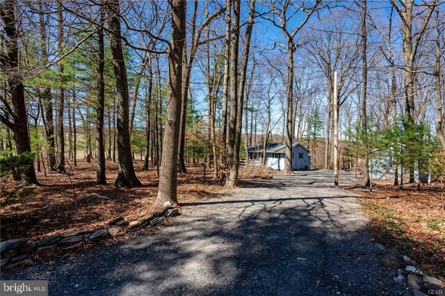 exterior space with aphalt driveway