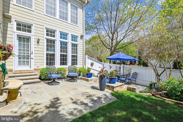 709 Pilot House Dr, Annapolis, MD 21401 - view of patio featuring fence and entry steps