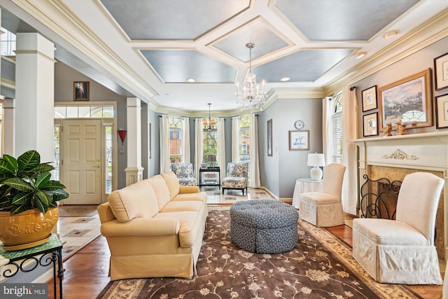 709 Pilot House Dr, Annapolis, MD 21401 - sitting room featuring a wealth of natural light, ornamental molding, an inviting chandelier, and decorative columns