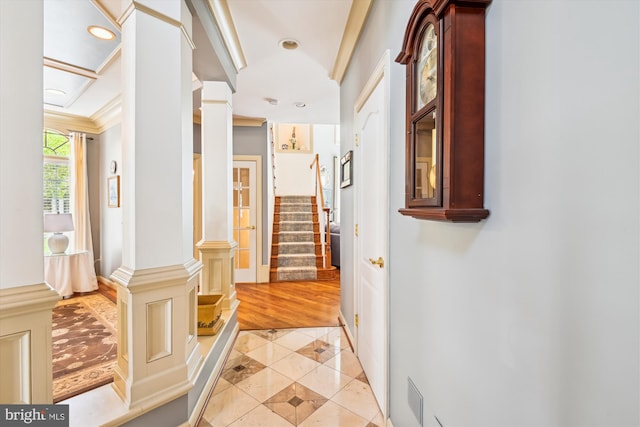 709 Pilot House Dr, Annapolis, MD 21401 - corridor featuring visible vents, ornamental molding, light tile patterned floors, decorative columns, and stairs