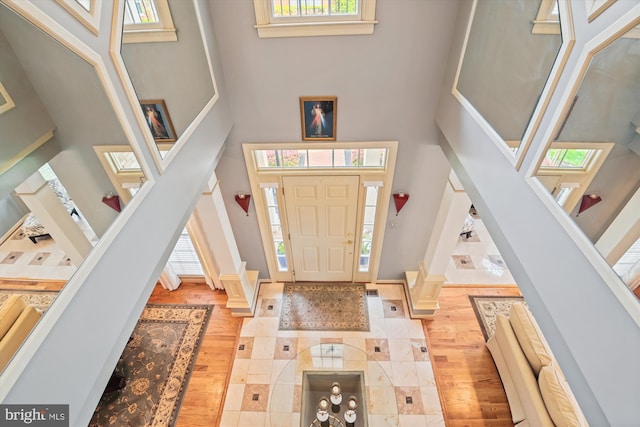 709 Pilot House Dr, Annapolis, MD 21401 - entryway with a towering ceiling, a healthy amount of sunlight, and stairs