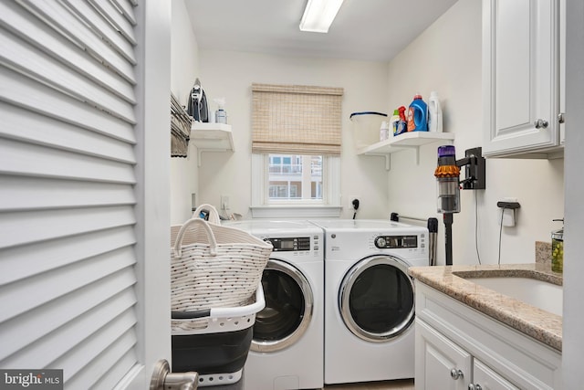 1082-E Long Beach Blvd, Long Beach Township, NJ 08008 - clothes washing area featuring washer and dryer and cabinet space