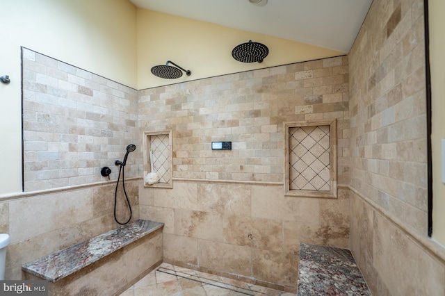 bathroom featuring tiled shower