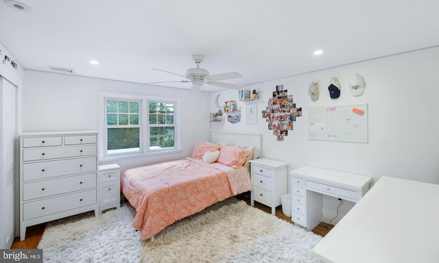 bedroom featuring visible vents, wood finished floors, recessed lighting, and ceiling fan