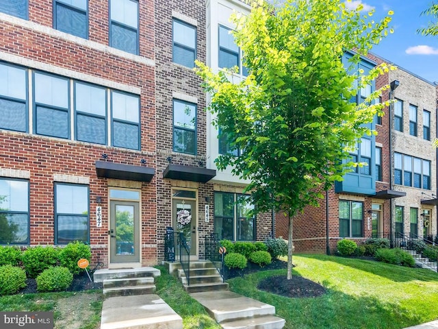 exterior space featuring brick siding