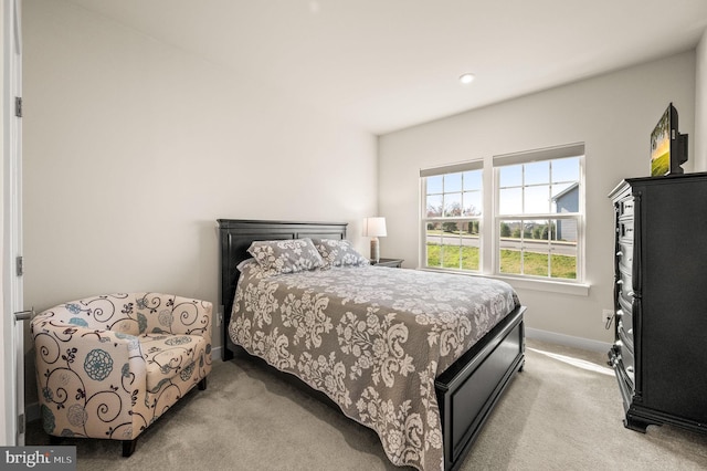 carpeted bedroom with baseboards and recessed lighting