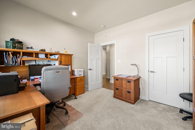 office space featuring visible vents, recessed lighting, and light carpet